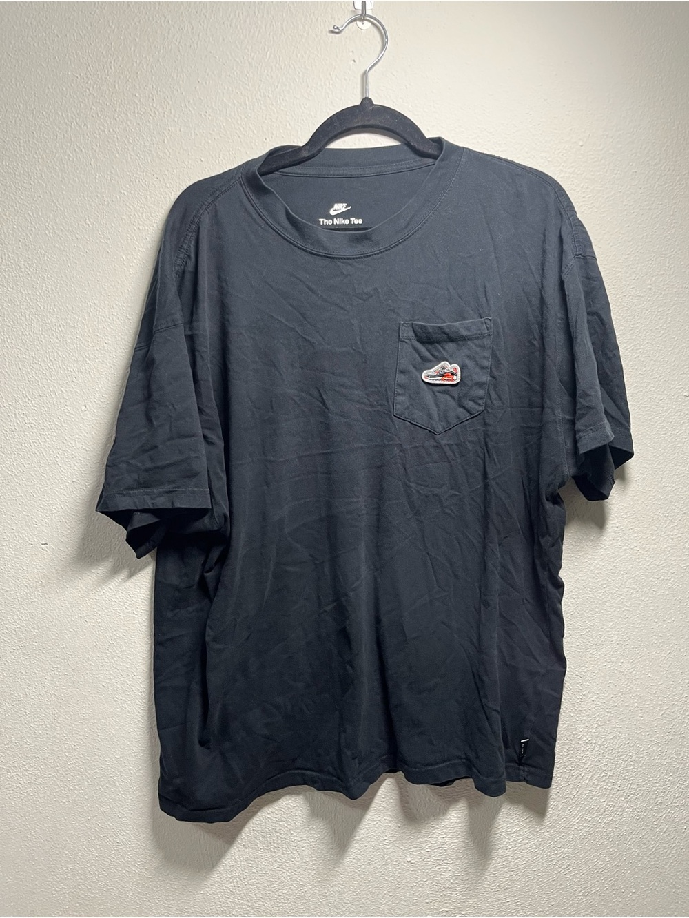 Nike Men’s Black Shoe Pocket T‑Shirt